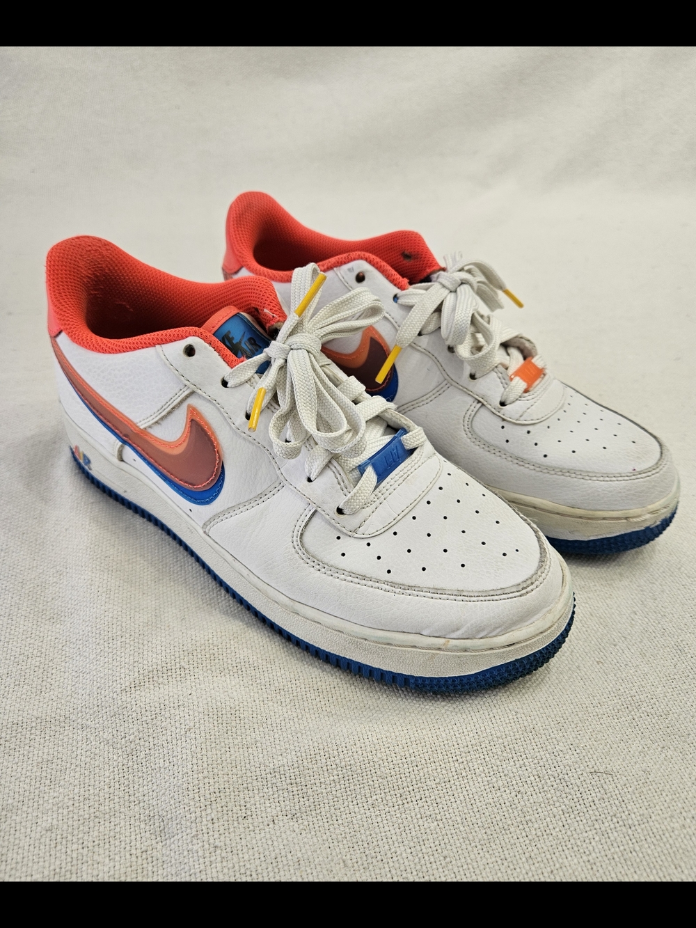 Nike White Sneakers with Coral & Blue Accents